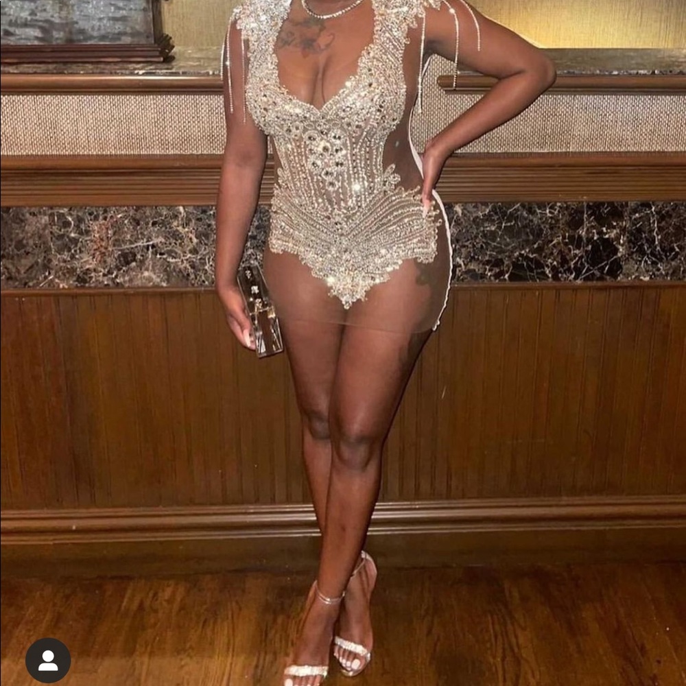 Brand new , never worn before sheer silver dress .